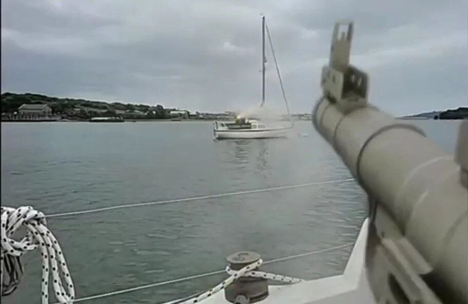 View from the yacht in Pirates with a comically oversized weapon aimed toward another boat