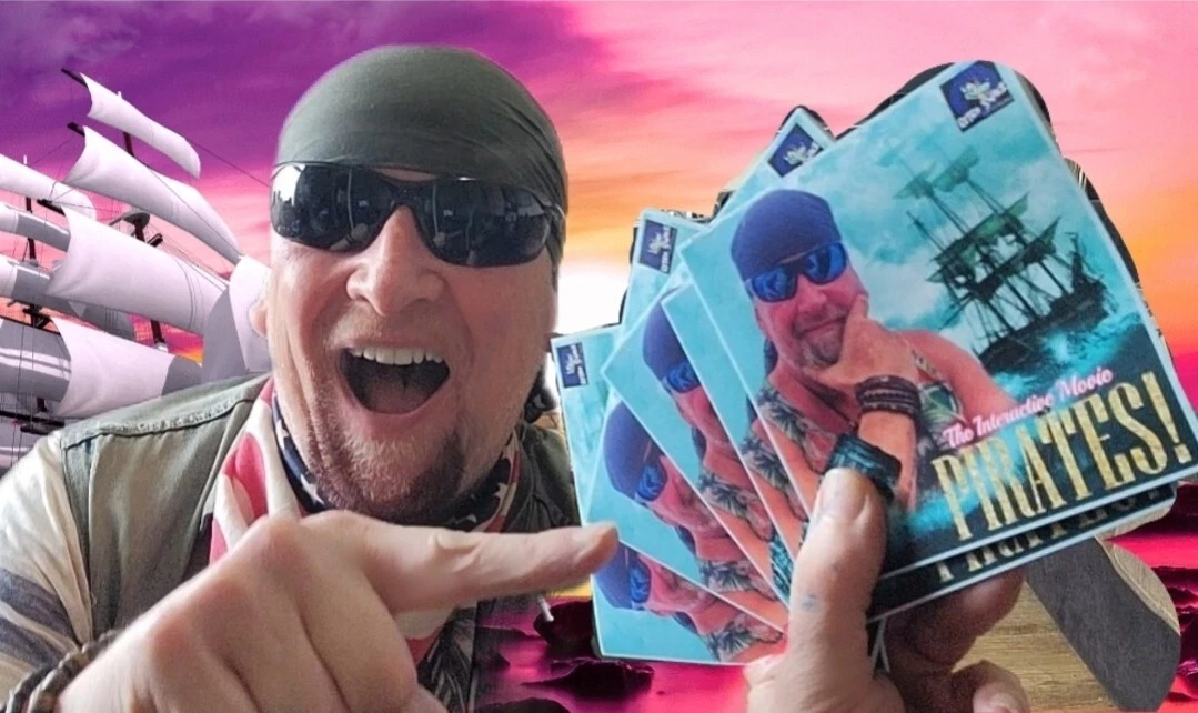 Cap'n Cat holding prototype Pirates physical media